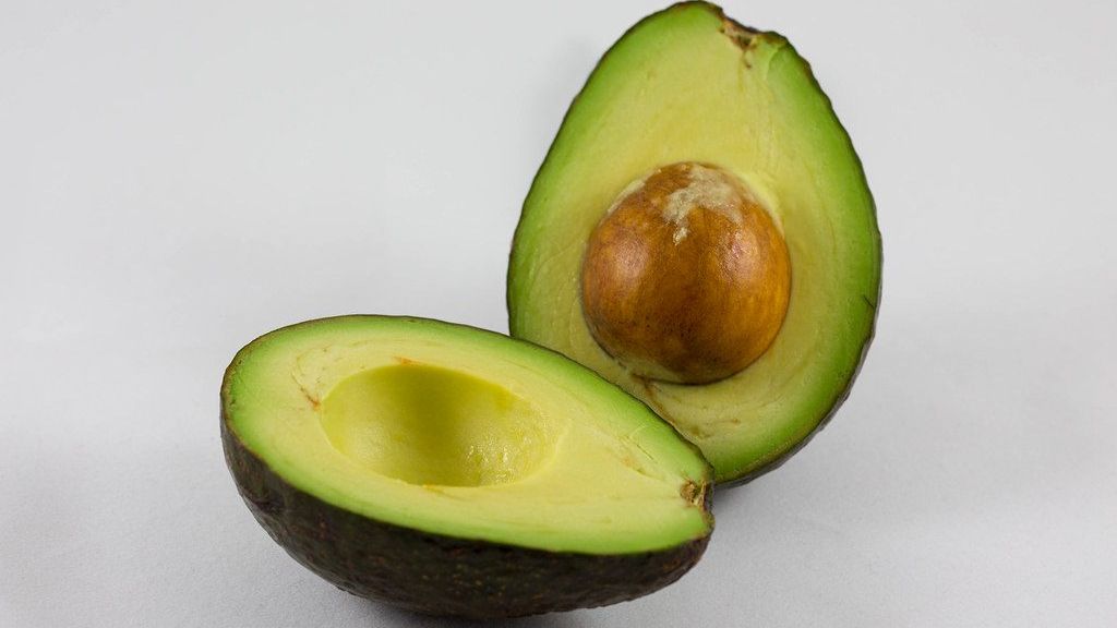 Ripe Hass avocado cut in half