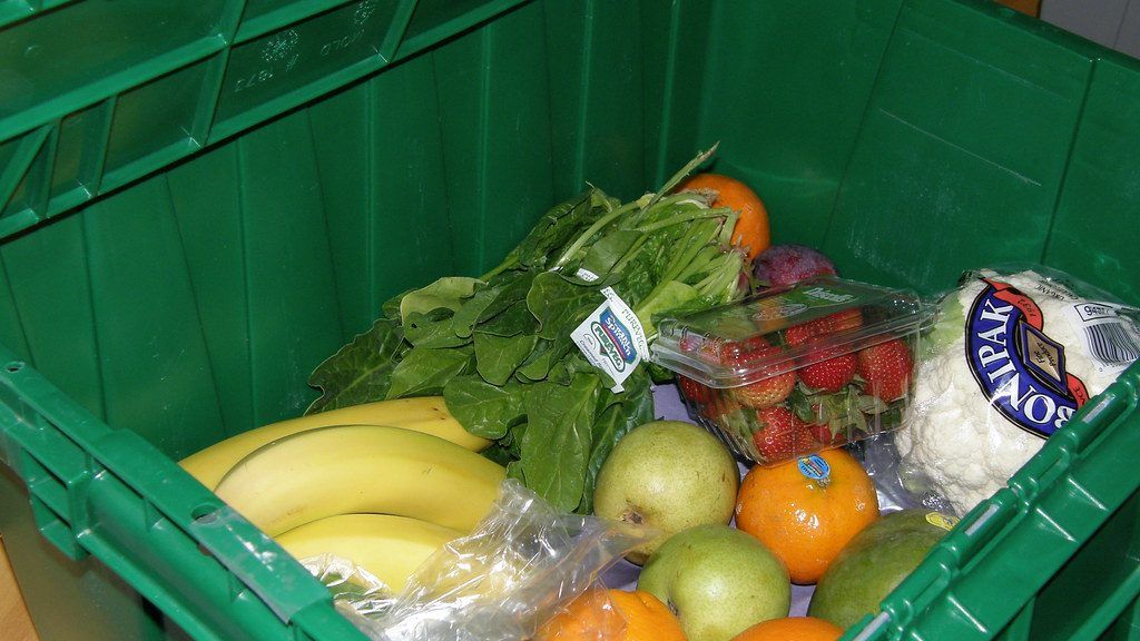 Crate of fresh fruit and vegetables delivered to the door