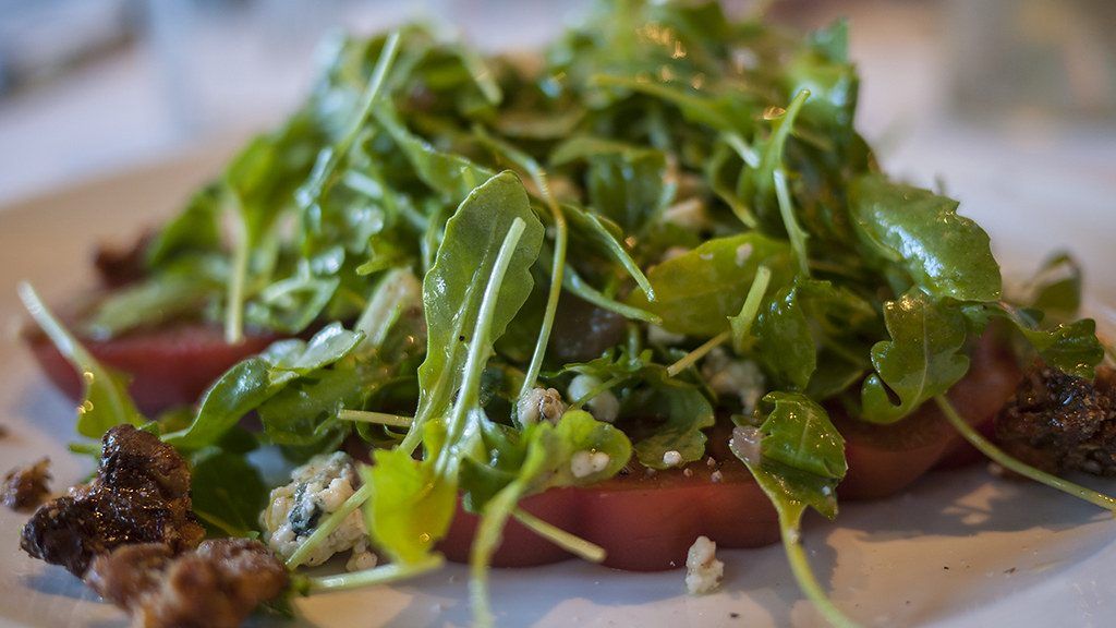 Plate of fresh arugula salad